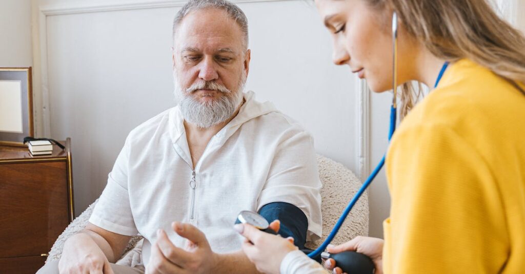 pexels-photo-7345474-7345474 A healthcare professional checks an elderly man's blood pressure in a cozy room.